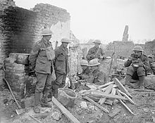 Troops of the 12th (Service) Battalion, KOYLI break for food amdist the ruins of Feuchy, April 1917. The Battle of Arras, April-may 1917 Q5196.jpg