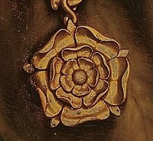 Detail of Tudor rose on the Collar of Esses livery chain Tudor Rose from Holbein's Portrait of More.jpg