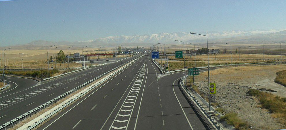 Turkish state road D 750 at Konya junction. Toros Mountains in the background.