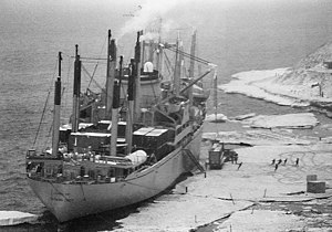 Severe cracks in an ice pier in use for four seasons at McMurdo Station slowed cargo operations in 1983 and proved a safety hazard. USNS Southern Cross at the ice pier in 1983.jpg