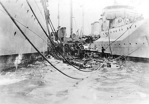 Benham, moored next to Ericsson (right), after her collision with HMS Zinnia