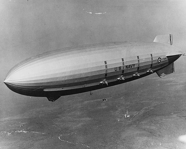 On the Macon, the exhaust water recovery condensers appear as dark vertical strips above each engine. The Akron and LZ 130 Graf Zeppelin had similar s