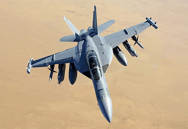 A US Navy EA-18G Growler, loaded with AGM-88 HARM anti-radiation missiles