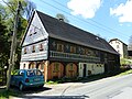 Residential stable house (surrounding area) with wooden shed extension