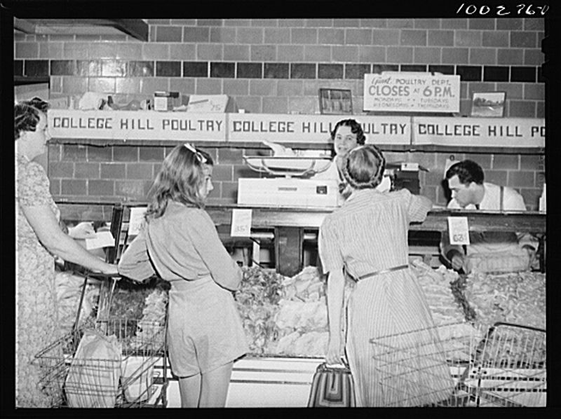 File:Washington, D.C. Shopper watching the weighing of a chicken 8c36419v.jpg