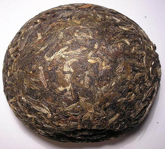 Sheng (raw) pu-erh tuo cha, a type of compressed aged raw pu-erh