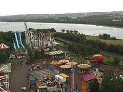 A number of rides at the park are pictured: at the far left is Moby's Revenge, the water slides. "M and Ds" near Strathclyde Park - geograph.org.uk - 38026.jpg