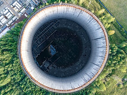 Cooling tower of unfinished second stage of CHP photographed from above. Lavriki, Vsevolozhsky district, Leningrad oblast, Russia.