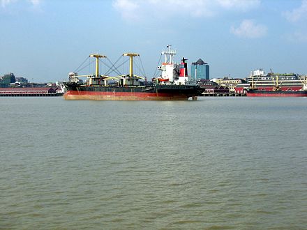 Cargo ships on the shores of Yangon River, just offshore of Downtown Yangon