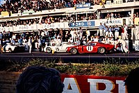 Sam Posey and Massimo Natili's Bizzarrini GT 5300 (start number 11) at the 1966 Le Mans 24-hour race