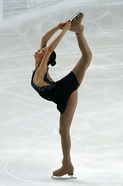 Yu-Na Kim performs a Bielmann spin during her short program at the 2011 World Figure Skating Championships