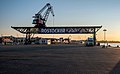 * Nomination Gantry crane on a former coal seafront, city harbor of Rostock, Mecklenburg-Vorpommern, Germany. --Moahim 06:27, 21 September 2019 (UTC) * Promotion  Support Good quality. Large dark foreground stresses sunset and solitude. --Axel Tschentscher 08:27, 21 September 2019 (UTC)