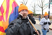 Proud Boys from Arizona marching to the Capitol building wearing orange hats 45.ProudBoys.USSC.WDC.6January2021 (50810015548).jpg