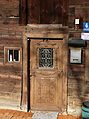 Thanning, Amtmannstraße 4; ehemals Armenhaus, zweigeschossiger Blockbau mit Flachsatteldach und verschaltem Vordach, 17./18. Jahrhundert. This is a picture of the Bavarian Baudenkmal (cultural heritage monument) with the ID D-1-73-120-81 (Wikidata)