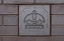 One of the "hallmark" bricks Assay Office Birmingham hallmark on wall - crown.jpg