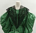 Black lace pelerine, green silk dress (reproduction) - DPLA - 3933cc41f0740130f1a79120498ee4ce (page 1) (cropped).jpg