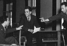 Hombres de mediana edad, entre ellos Francisco Boix en los Juicios de Nuremberg en contra de los nazis por sus abusos