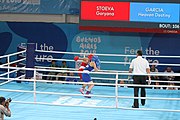 Deutsch: Boxen bei den Olympischen Jugendspielen 2018 Tag 12, 18. Oktober 2018 - Kampf um die Bronzemedaille im Fliegengewicht Mädchen – Heaven Destiny Garcia (USA, blau) schlägt Goryanana Stoeva (Bulgarien, rot) 5-0; Ringrichter ist Ishanguly Meretnyyazov (Turkmenistan). English: Boxing at the 2018 Summer Youth Olympics on 18 October 2018 – Girl's flyweight Bronze Medal Bout - Heaven Destiny Garcia (USA, blue) beats Goryanana Stoeva (Bulgaria, red) 5-0; Referee is Ishanguly Meretnyyazov (Turkmenistan). Español: Boxeo en los Juegos Olímpicos Juveniles de Verano de 2018 en 18 de octubre de 2018 - Combate a medalla de bronce de peso mosca para mujeres: Heaven Destiny Garcia (Estados Unidos, azul) le gana a Goryanana Stoeva (Bulgaria, roja) 5-0; El árbitro es Ishanguly Meretnyyazov (Turkmenistán).