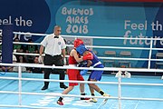 Deutsch: Boxen bei den Olympischen Jugendspielen 2018 Tag 12, 18. Oktober 2018 - Finale Leichtgewicht Mädchen – Junioren-Weltmeisterin und dreifache Juniorinnen-Europameisterin Caroline Sara DuBois (Großbritannien, blau) schlägt Juniorinnen-Asienmeisterin Porntip Buapa (Thailand, rot). English: Boxing at the 2018 Summer Youth Olympics on 18 October 2018 – Girls' lightweight Gold Medal Bout – Caroline Sara DuBois (Grat Britain, blue) wins over Porntip Buapa (Thailand, red). Español: Boxeo en los Juegos Olímpicos Juveniles de Verano de 2018 en 18 de octubre de 2018 - Combate de medalla de oro de peso ligero para niñas - Caroline Sara DuBois (Gran Bretaña, azul ) gana sobre Porntip Buapa (Tailandia, rojo).