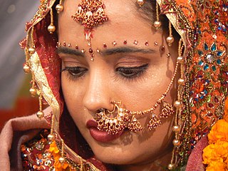 Bindi (decoration) Dot worn on the center of the forehead