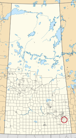 Peta provinsi Saskatchewan menampilkan 297 kota pedesaan dan ratusan kecil India cadangan. Salah satu yang disorot dengan lingkaran merah.