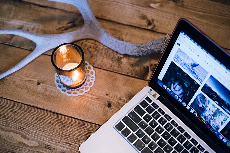 File:Candle, antler and laptop (Unsplash).jpg