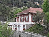 L'Elèctric, centre cívic al costat de l'estació de les Planes. Edifici noucentista amb protecció urbanística (nivell C). Carretera de Vallvidrera a les Planes 98.