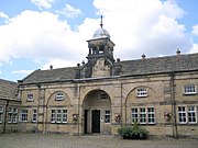 Former coach house or stable block*