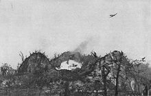 A F4U Corsair drops napalm on Japanese positions atop Umurbrogol. Corsair attacks jap bunker on Peleliu.jpg