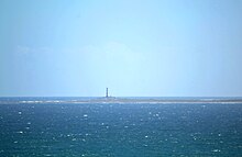 Dassen Island and lighthouse, 9km off the coast of Yzerfontein. Lighthouse is 28m, circular iron tower with white and red bands. 1893. 02.JPG