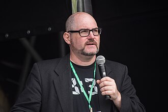 David A. Kirby presenting as co-headliner at the Geek Picnic in 2017, St. Petersburg, Russia. David A. Kirby at Geek Picnic 2017.jpg