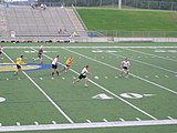 A Detroit player solos the ball