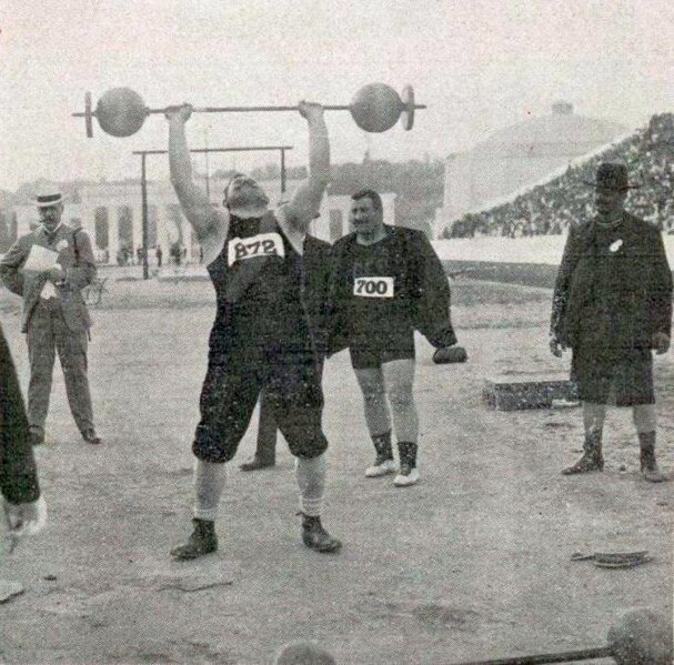 File:Dimitrios Tofalos (no. 872) & Josef Steinbach (no. 700) at the 1906 Summer Olympics weightlifting competition.jpg