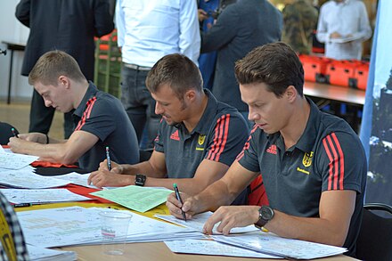 Martin Wolfram, Sascha Klein and Patrick Hausding (from left) at the Clothing of the German Olympic team.