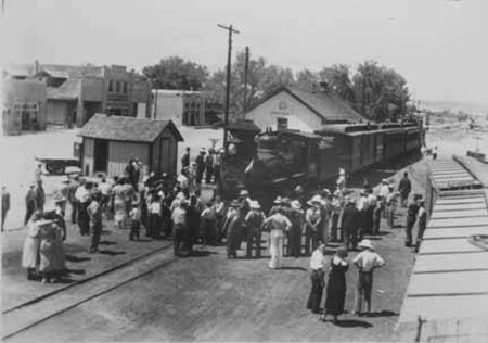 Townspeople gather at the depot, 1930