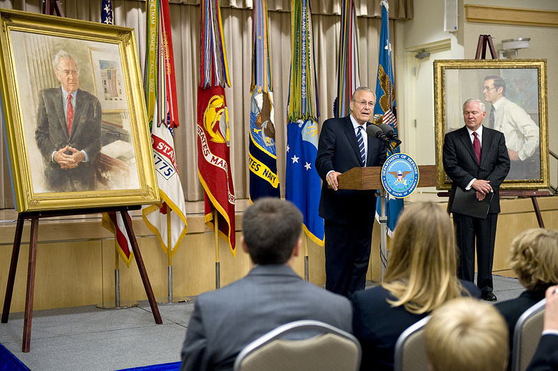 File:Former Secretary of Defense Donald H. Rumsfeld, left, addresses the audience while Secretary of Defense Robert M. Gates, right, looks on during Rumsfeld's portrait unveiling ceremony at the Pentagon June 25 100625-D-JB366-025.jpg