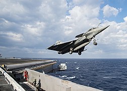 French Navy Rafale M performs touch and go landings on the USS Dwight D. Eisenhower (CVN 69)