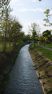 The Fußenau Canal in Dornbirn with a view of the Rhine Valley motorway A14, junction Dornbirn-Nord