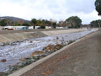 This grouted sloping boulder drop on Trabuco Creek in California is almost entirely covered by floodwater. GroutedSlopingBoulderDrop.JPG