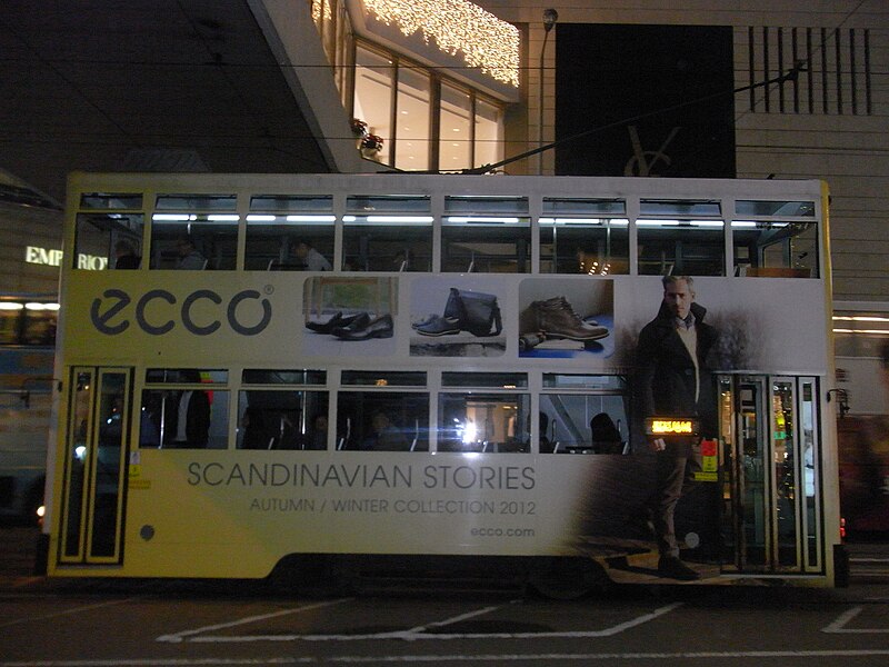 File:HK Central Des Voeux Road evening Tram body ads ECCO Dec-2012.JPG