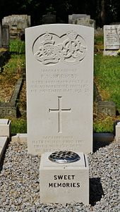 CWGC headstone of a QOOH gunner who died a few months after the end of the Second World War. The stone bears the dual insignia of the Royal Artillery (left) and QOOH (right). HornsbyP RoseHillCemetery headstone.jpg