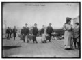Immigrants carrying luggage, Ellis Island, New York LCCN2014683246.tif