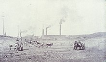 Horse-drawn carriages removing earth during the original construction of the canal system, c. 1855. Initial digging of the Holyoke Canal System.jpg