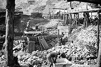 A typical gold mining operation, on Bonanza Creek. Klondike mining camp.jpg