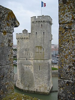The fortified harbour of La Rochelle in western France became a Protestant stronghold that was fought over in two lengthy sieges. La Rochelle-Tour St Nicolas.JPG