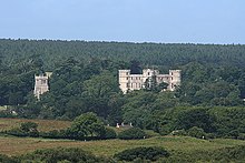 Lulworth Castle and tower of St Andrew's C of E Church Lulworth Castle and Church - geograph.org.uk - 855714.jpg