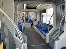 An interior photo of a Type III LRV showing the sideways-facing seats in the center section. Metro Transit Type III LRV interior.jpg