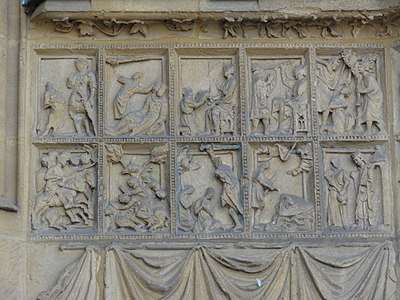 13th-century sculpture around the portal; The story of David and Goliath (above) and the martyrdom of Saint Maurice (bottom)