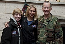 Deborah Mullen, Anna Kournikova, and Michael Mullen hosting the USO Holiday Troop Visit, 2009 Michael & Deborah Mullen with Anna Kournikova.jpg