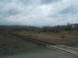 Район городка Милн. Железная дорога на переднем плане - главная ветка шахты Шерман.